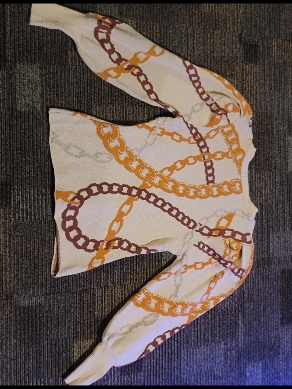 Flying Tomato Cream Sweater with Orange and Brown Chain Print